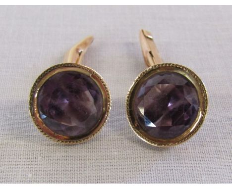 Pair of Amethyst &amp; gold cufflinks marked 14k - Stone 1.2cm - total weight 7.6g