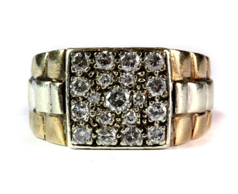 A  heavy gentleman's yellow metal (tested minimum 9ct gold) diamond set signet ring (P.5).