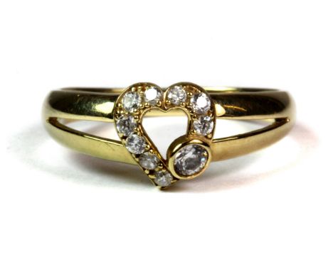 A 9ct yellow gold (stamped 9K) stone set ring (R).