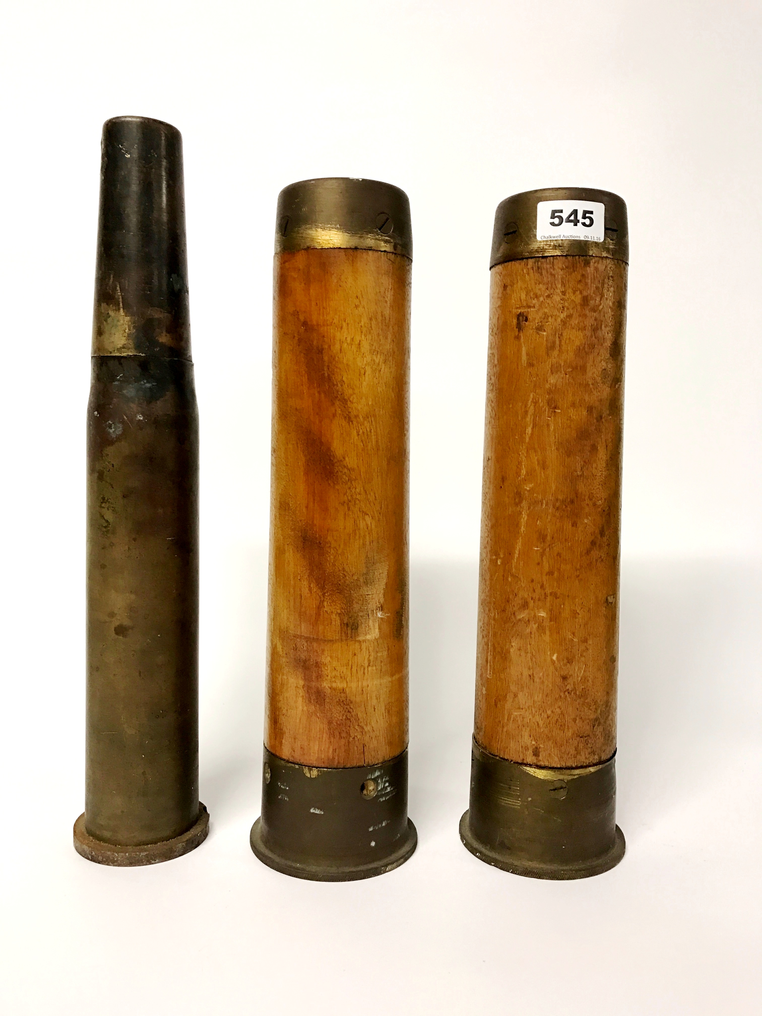 Two British World War II naval 12pdr shells for a QF 4inch Mk V gun dated 1944 and a further Nav