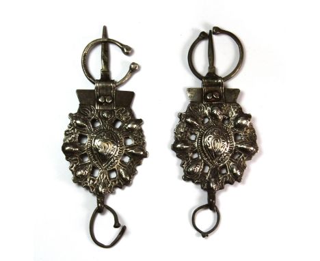 A pair of 18th century or earlier Ottoman silver cloak fastners with makers marks to reverse. W. 14cm. Prov. Private West End