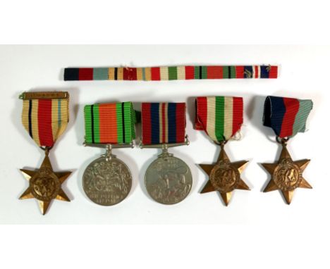 Four World War II medals and one medal with 1st Army bar including ribbon bar.