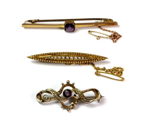 Two 9ct yellow gold brooches and one yellow metal (tested minimum 9ct gold) brooch set with seed pearls, L. 6.5cm, 5.5cm and 