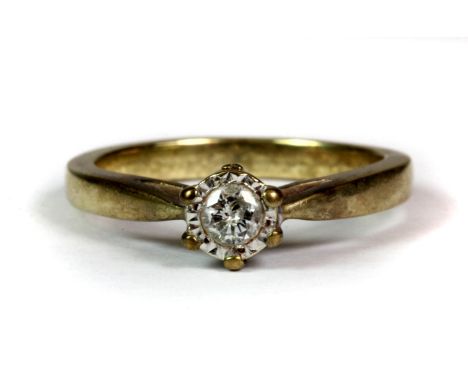 A yellow metal (tested minimum 9ct gold) diamond solitaire ring (N).