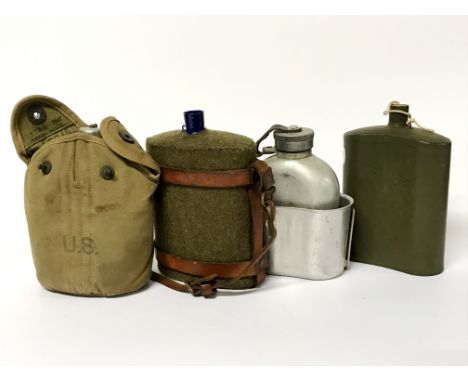 Two World War I British Army issue water bottles, one US issue water bottle and one World War II British issue bottle and foo