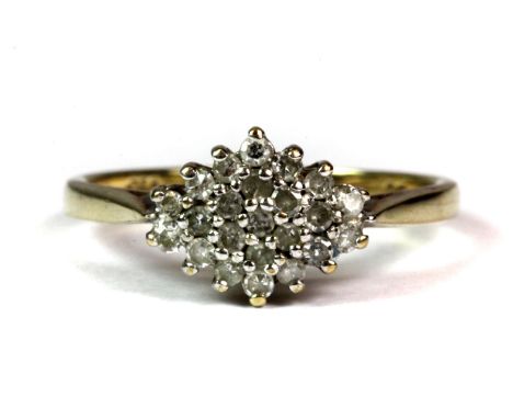 A 9ct yellow gold diamond set cluster ring (N.5).