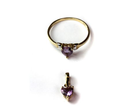 A 9ct yellow gold (stamped 9ct) ring set with a heart shaped amethyst (N.5) and matching pendant.