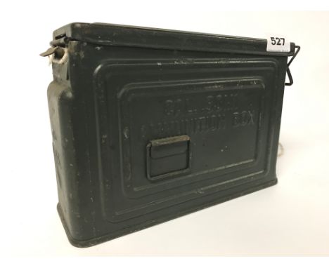 A World War II US issue .30 caliber M1 ammunition box with a further World War II ammunition box full of cartridges.