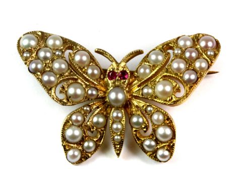 A lovely 9ct yellow gold butterly shaped brooch set with rubies and seed pearls, L. 3.4cm.