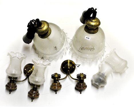 Two large glass pull down light fittings and a pair of matching wall lights.