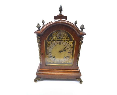 Winterhalder &amp; Hofmeier oak cased bracket clock with applied cast metal decoration fitted with a brass movement striking 