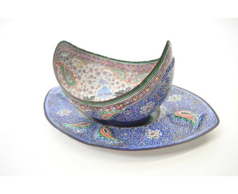 Persian style enamel boat shaped bowl with similarly decorated stand, stand 27cm long