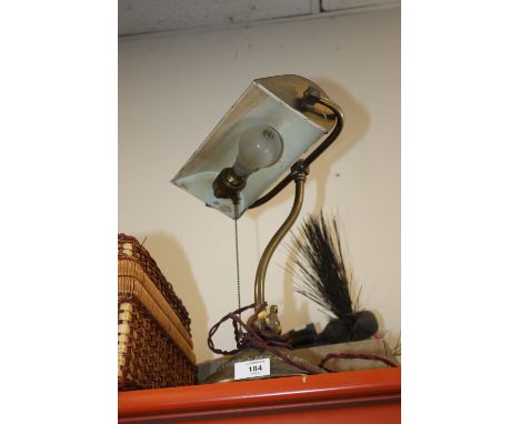 A VINTAGE BRASS BANKERS LAMP