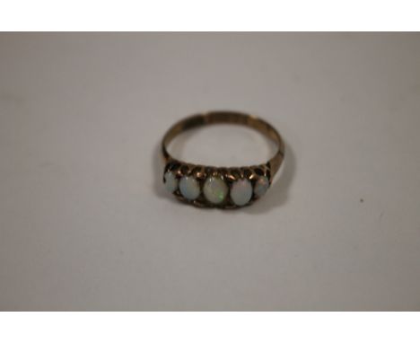 A VINTAGE 9 CARAT GOLD  5 STONE OPAL DRESS RING