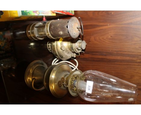 A VINTAGE MINERS LANTERN TOGETHER WITH A CONVERTED OIL LAMP PLUS ANOTHER (3)