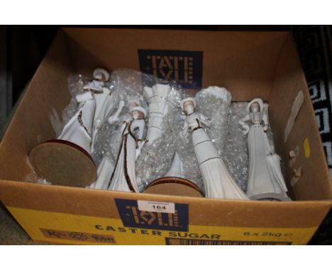 A TRAY OF CERAMIC LADY FIGURES
