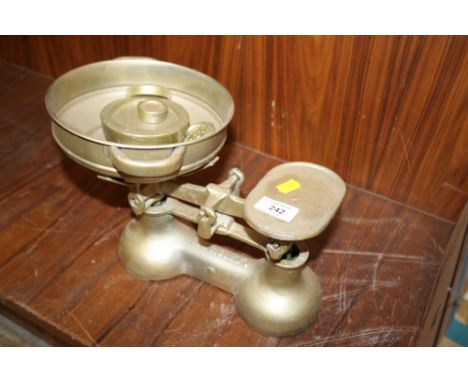 A CAST SET OF SCALES AND WEIGHTS 