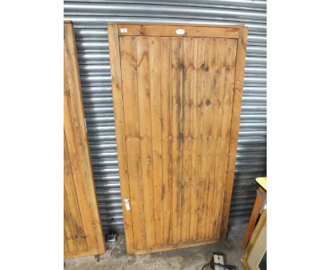 A WOODEN GARDEN GATE