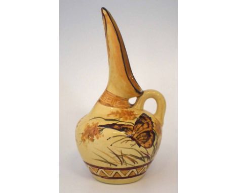 Ault Christopher Dresser design ewer, painted with a butterfly amongst flora, moulded mark to base, 24cm high Condition repor