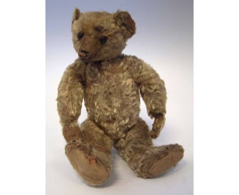 William Terry teddy bear with button eyes, jointed limbs and blond fur, early 20th century, 33cm high Condition report: Fur l