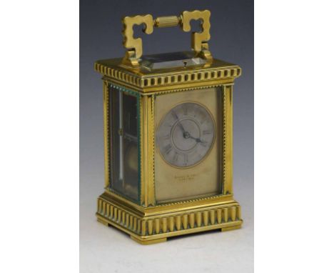 French brass carriage clock, late 19th century, retailed by Angus &amp; Sons, Liverpool, the silvered Roman dial in a gilt fr