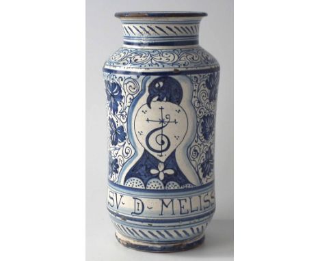 Maiolica albarello painted in blue with a birds head and crest, labelled 'SV-Di- Melissa' 19th century, 29cm high Condition r
