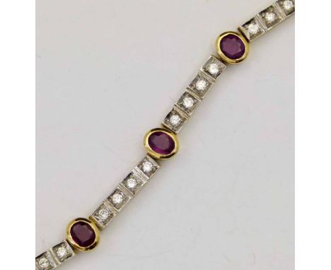 Italian 750 ruby and diamond line bracelet of seven oval rubies interspersed by blocks of four brilliants, length 18.5cm, 23.