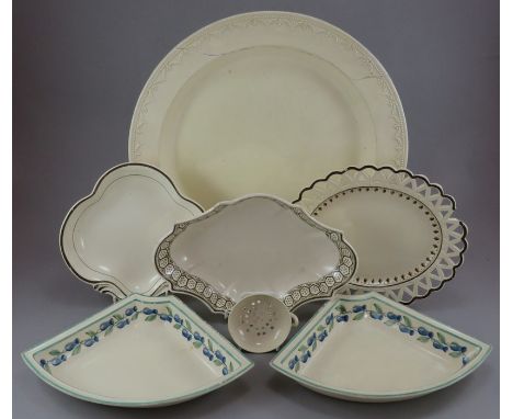 A group of early nineteenth century creamware pieces, c.1800-1820. To include: a large serving charger, a handled dessert dis