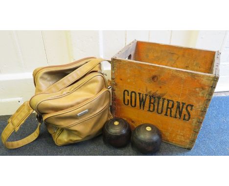 A set of four vintage lignum vitae bowls with inset Ivorine roundles together with a corresponding 'Jack' and Cowburns vintag
