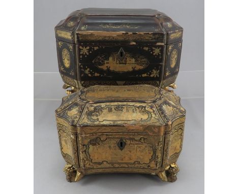 An early 19th century black papier Mache two section tea caddy of cartouche form. Painted with gilt scenes of pseudo Chinese 