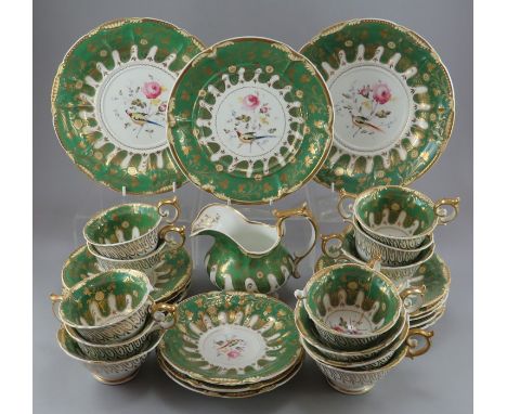 An early nineteenth century Davenport porcelain part tea service, c.1820-30. It is hand-painted with birds and flowers with a