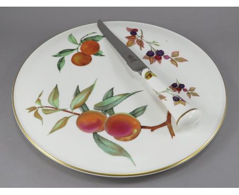 A late twentieth century Royal Worcester cake plate and matching knife, c. 1974. Both pieces decorated with fruit and marked 
