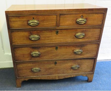 A George IV caddy top mahogany low chest of two short over three long drawers with ebony strung detail and apron and splay su