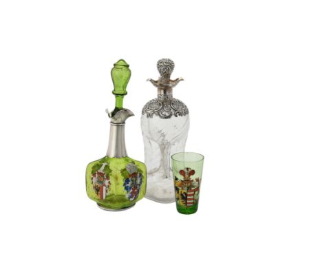 
	
		A late Victorian shaped glass and silver mounted decanter and stopper by Henry Matthews, Birmingham 1900, chased and pie