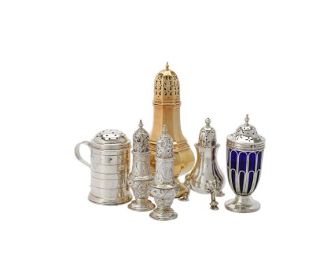 
	
		An Edwardian silver cylindrical caster by West &amp; Son, London 1903, with a scroll handle and reeded bands, 11cm (4 1/