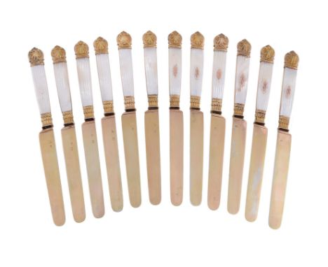 
	
		Y&nbsp;A matched set of twelve French silver gilt dessert knives, nine with maker's mark LM, Paris 1819-38, .800 standar