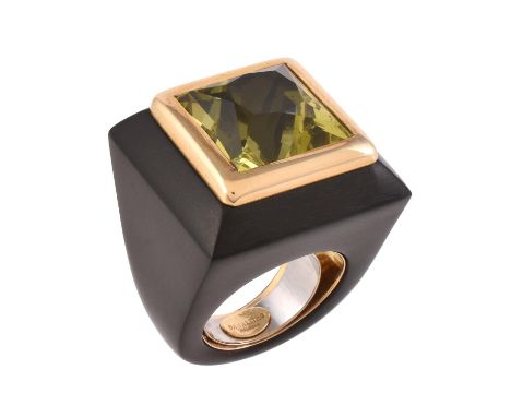 
	
		A lemon quartz and ebony dress ring by Sanalitro Gioielli, Milan, the fancy cut square lemon quartz rub over set in an e
