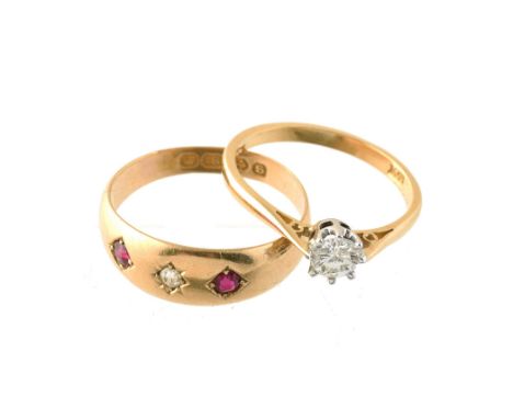 
	
		An Victorian ruby and diamond three stone ring, the old cut diamond flanked by circular cut rubies, hallmarked Birmingha