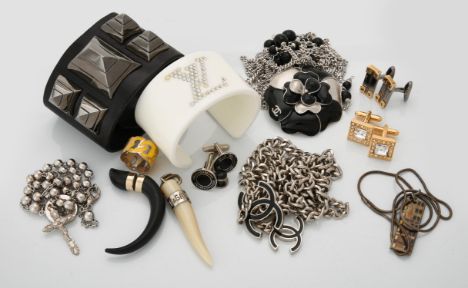 
	
		A collection of designer costume jewellery, including a yellow enamelled chain link style ring signed Vivienne Westwood,