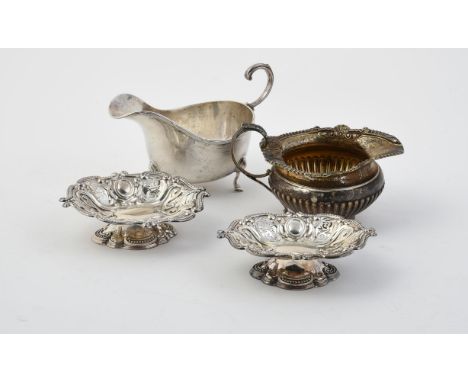 
	
		A Victorian silver cream jug by Goldsmiths &amp; Silversmiths Co., London 1894, with a nulled and foliate border, a leaf