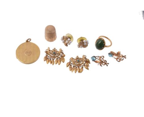 
	
		A small collection of jewellery, to include a circular hinged locket, dated 1917 to the front, stamped 9ct, 3.1cm diamet