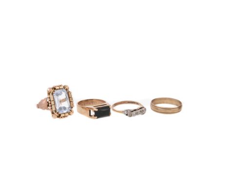 
	
		A 1940s continental synthetic spinel dress ring, the rectangular mixed cut synthetic spinel within a two colour scrolled