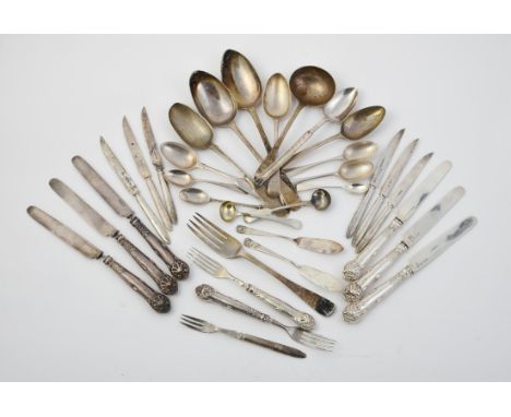 
	
		A collection of silver flatware, to include: a William IV Old English pattern table spoon by Robert Hennell II, London 1