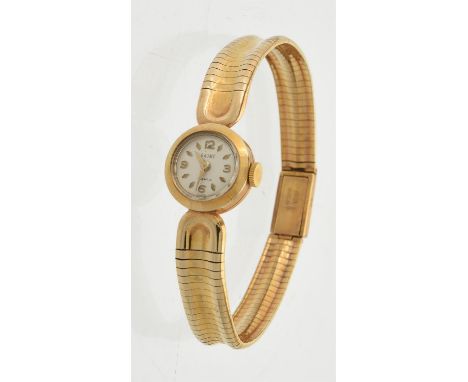 
	
		Baume,
		Lady's 9 carat gold bracelet watch, circa 1958
		Movement: Manual wind, 17 jewels
		Case: 9 carat gold case, sn