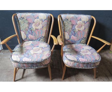 A Pair of Ercol Armchairs. Need new webbing 