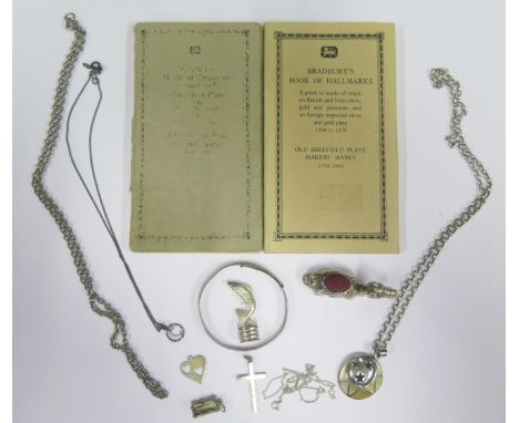 A Sterling Silver Pin Cushion in the form of a camel, silver pendant necklace, cross, chains etc. and two hallmark books