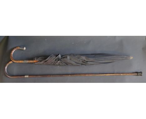 A Silver Collared Walking Stick (87cm) and Fox &amp; Co. umbrella. Some faults 