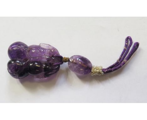 A Chinese carved Amethyst Gourd Pendant, 10cm overall length 