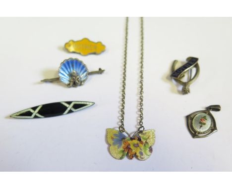 Three Sterling Silver and Enamel Brooches, silver pendant and two other enamels 