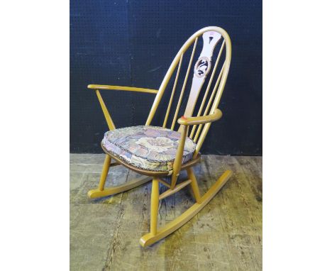 An Ercol Swan Back Rocking Chair, 91cm high 
